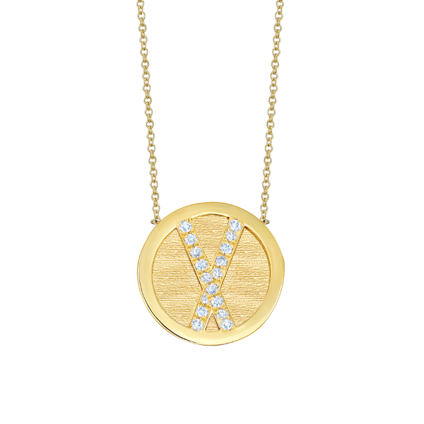 Crafted in 14K yellow gold, this medallion, part of a twelve-piece collection, reflects Roman culture with white pave diamonds forming a birth month, open to the wearer’s unique interpretation - Gabriela Artigas