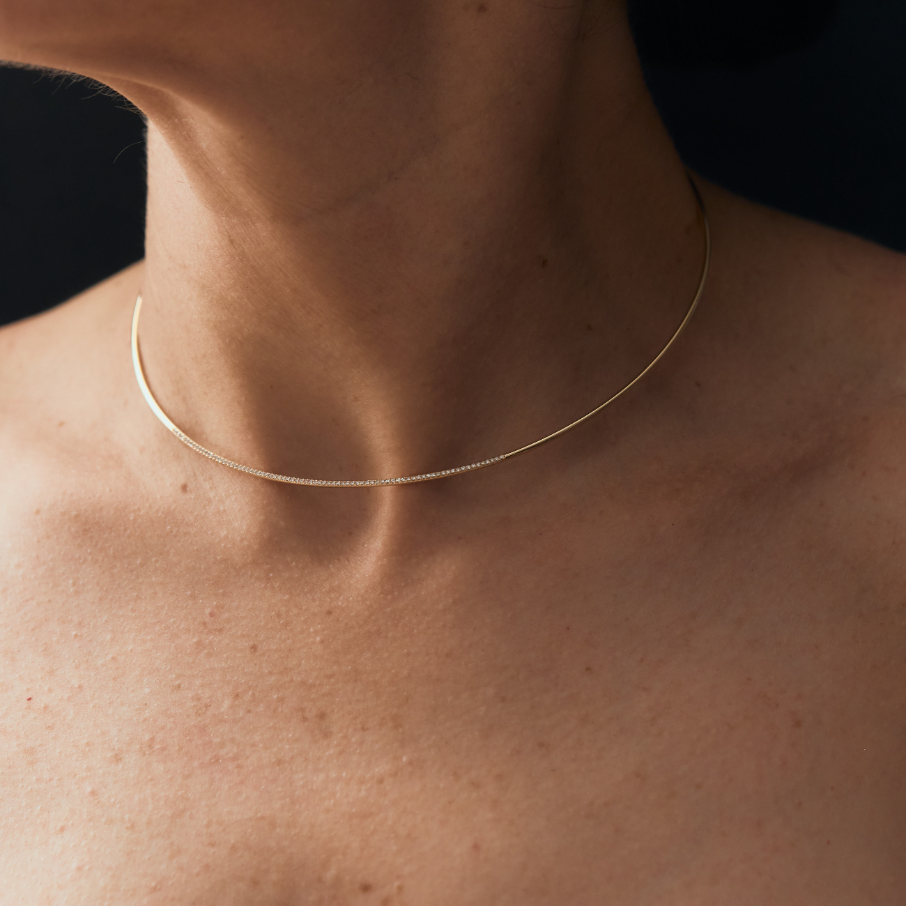 Gold thin-line chunky choker adorned with a sparkling row of white pavé diamonds, blending minimalist elegance with bold, impactful shine - Gabriela Artigas