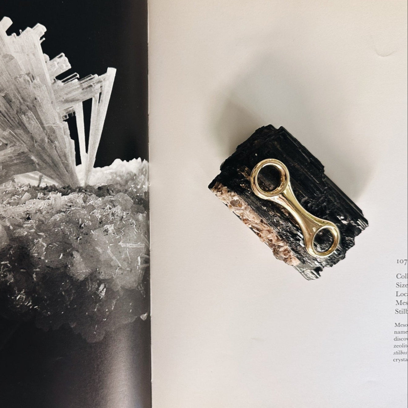 gold paperweight with a dual beam link design - Gabriela Artigas