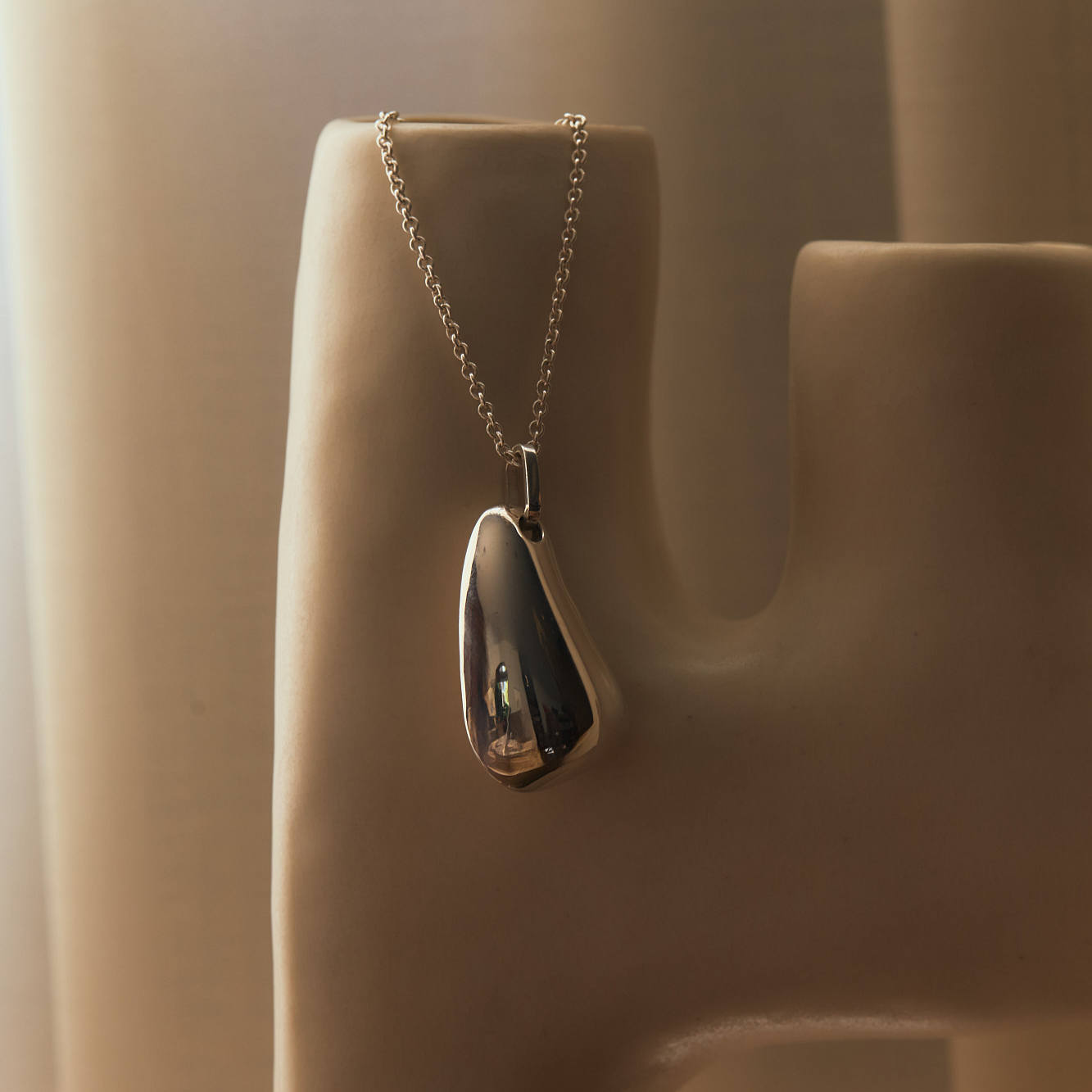 Statement Balloon Pendant Necklace, gold vermeil with a flowing form and defined edges, draped on a fine chain with a tusk clasp - Gabriela Artigas