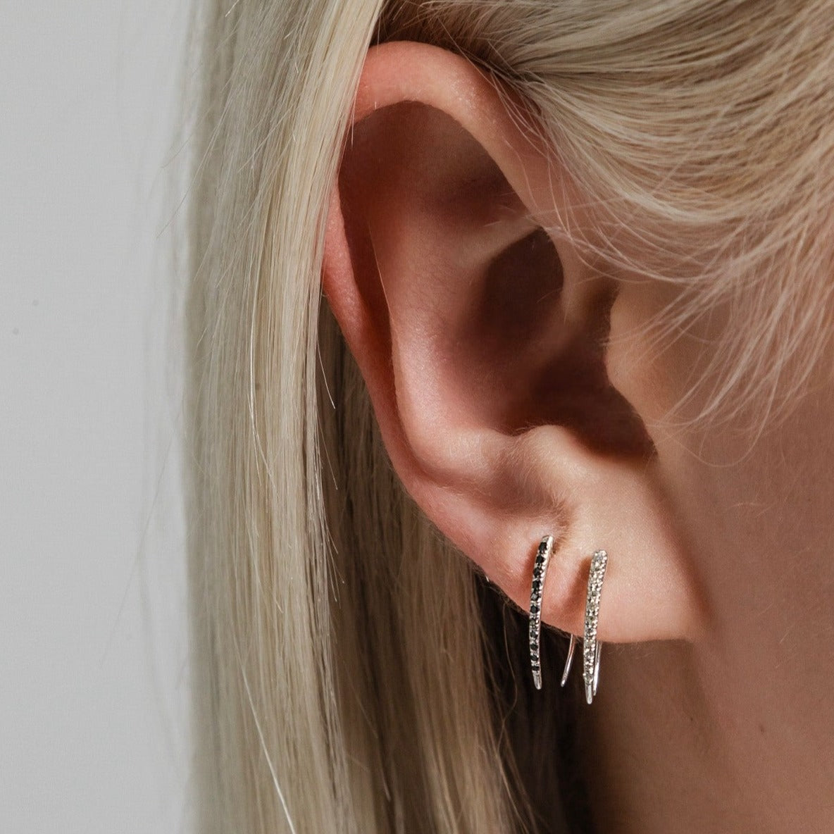Classic Infinite Tusk earrings featuring black pavé diamonds - Gabriela Artigas