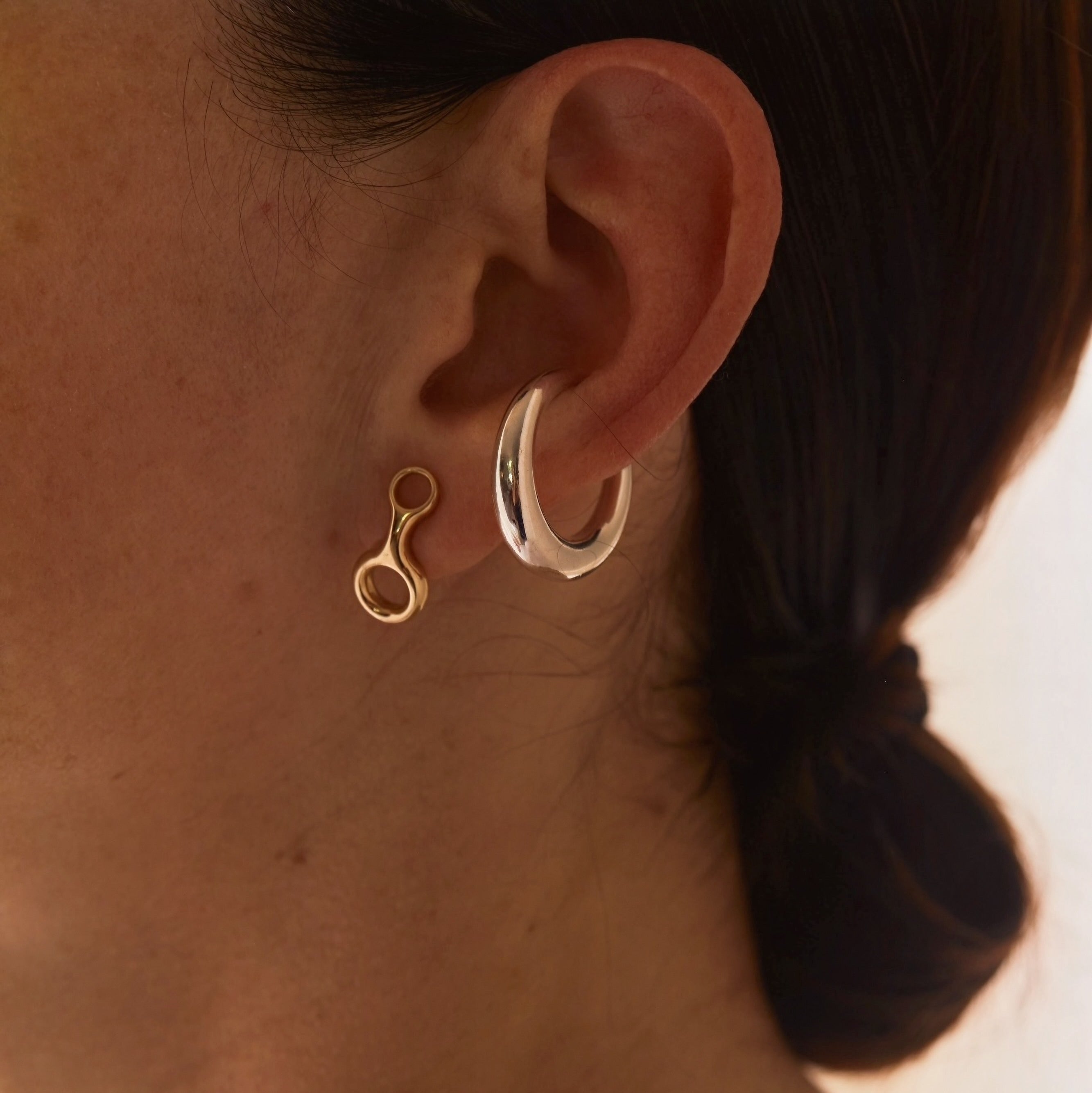 Yellow gold Grande Colmillo Ear Cuff, blending soft, sculptural fluidity with a crisp frame, perfect for a unique ear accessory - Gabriela Artigas