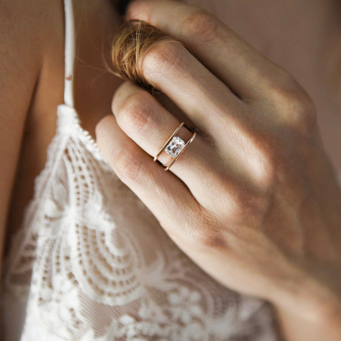 Unique Love V Ring, showcasing a floating diamond within a V-shaped form, with varied clarity and color for timeless allure - Gabriela Artigas