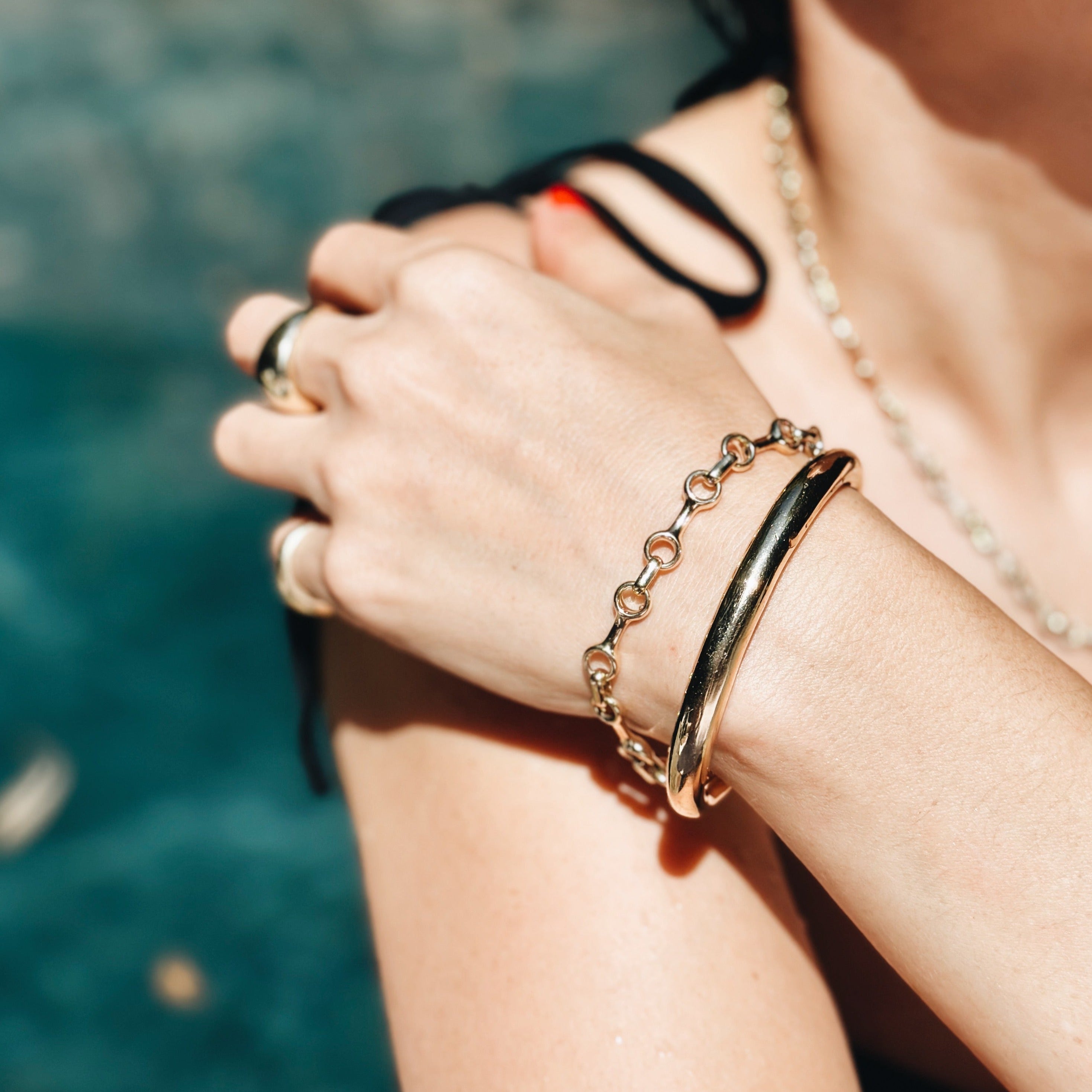 Charming mini double beam vermeil gold chain bracelet with a tusk clasp, designed to pair beautifully with a gold-finished bangle - Gabriela Artigas