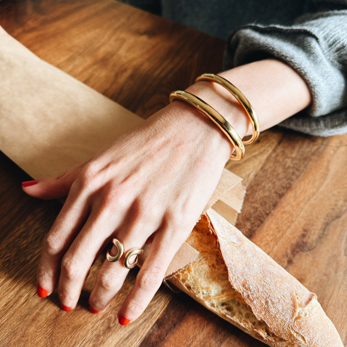 Architectural Double Beam ring with parallel bars and curved edges, minimalist design suited to everyday luxury and equestrian-inspired precision