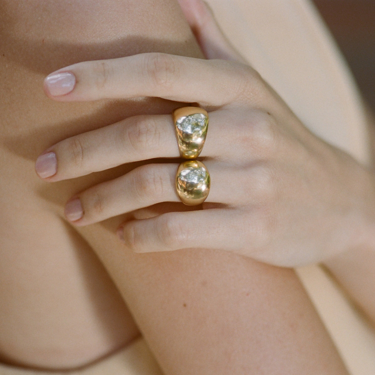 A gold flat balloon ring showcasing a sleek and elegant style - Gabriela Artigas