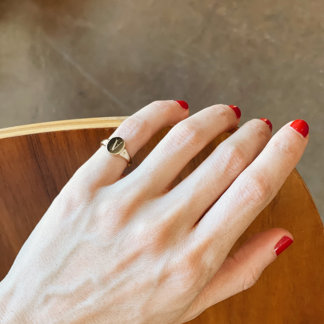 Disc signet ring in vermeil gold featuring a beautifully crafted 'V' alphabet design - Gabriela Artigas