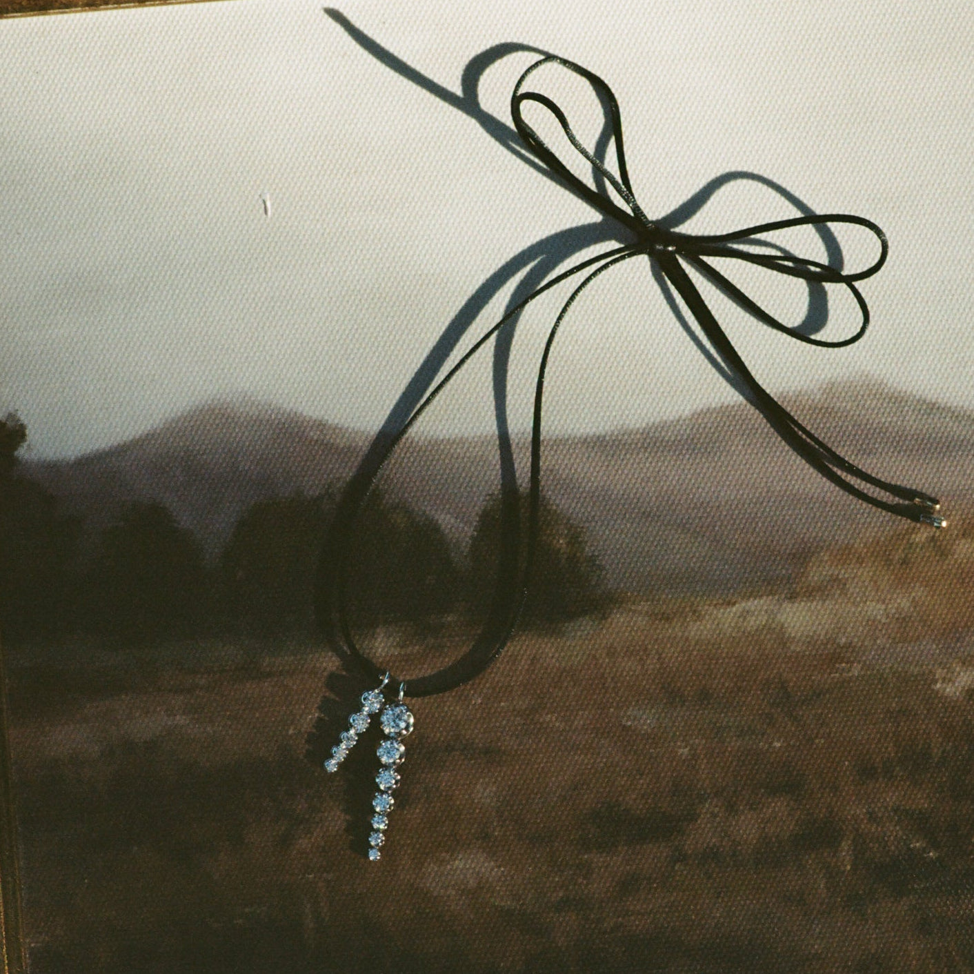 Drops on Black Silky Cord